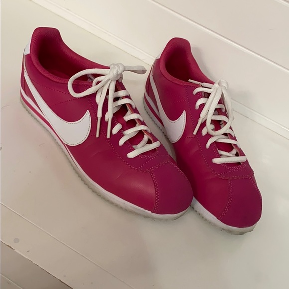 pink and white nike cortez